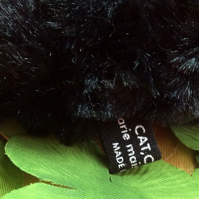 Ｐｏｗａ　Ｐｏｗａ黒猫ボールチェーンバッグチャームのタグ部分のクローズアップ画像