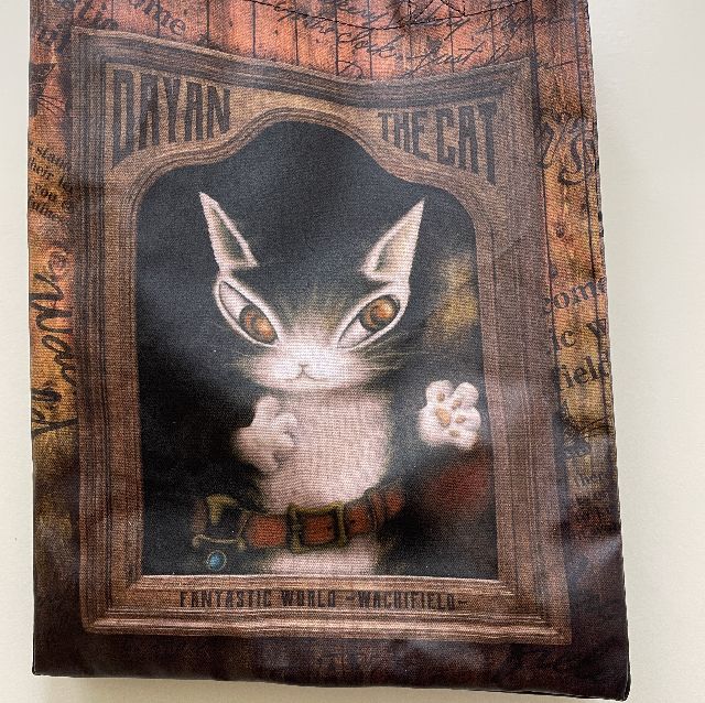 猫のダヤンのラミネートレッスンバッグ「肖像画」柄の絵柄のクローズアップ画像