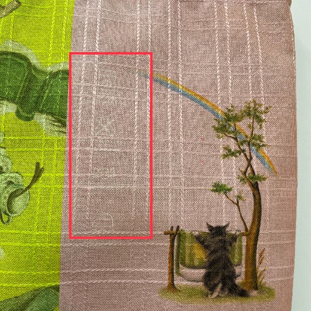 猫のダヤンの麻ふうトートバッグ格子状「お茶の時間」柄の背面側絵柄のクローズアップした画像