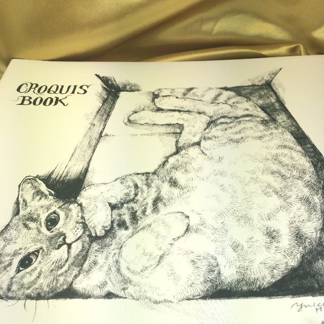 ヒグチユウコ×ホルベイン2020クロッキーブック寝そべり猫柄の表紙の画像