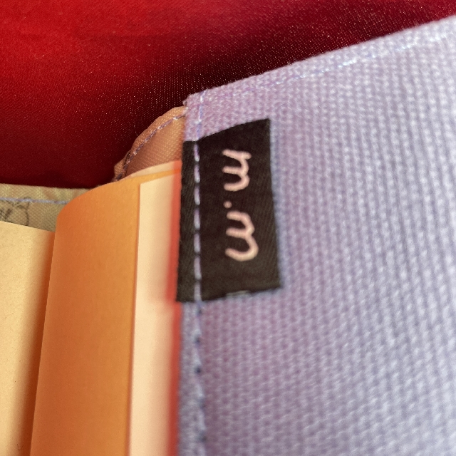 松尾ミユキの文庫本用刺繍ブックカバーの内側のロゴマークの画像