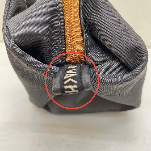猫のダヤンの2WAYポーチダヤン柄のロゴタグ画像