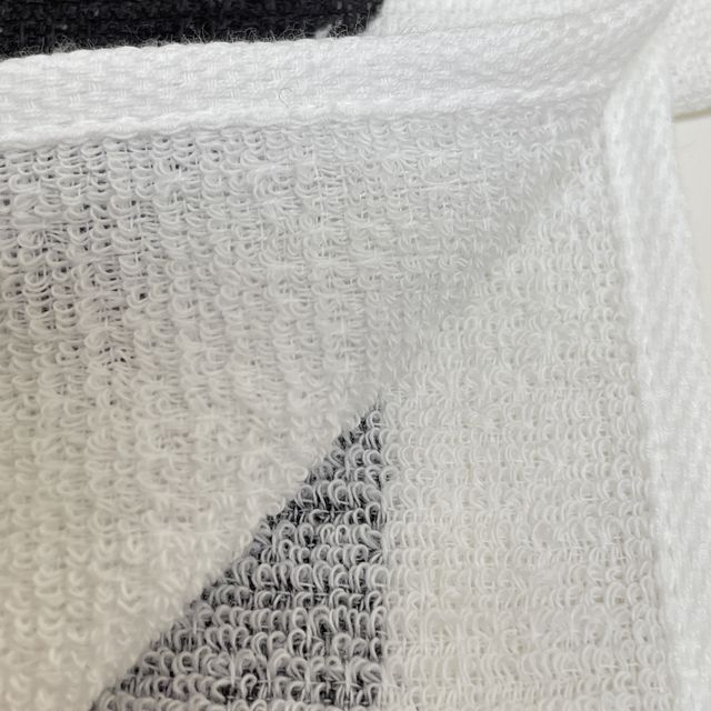 コンテックスの今治タオルのタオルてぬぐい「くろねこ」柄の裏側画像