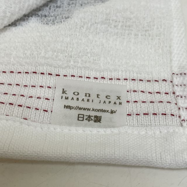 コンテックスの今治タオルタオルてぬぐい「くろねこ」柄のタグの画像