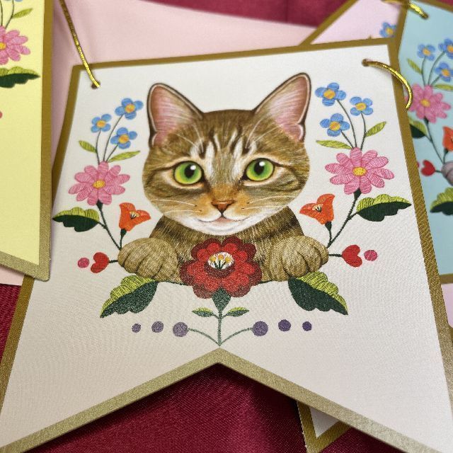 アクティブのフェリシモ猫部バースデーカードガーランドのトラ猫カードの画像