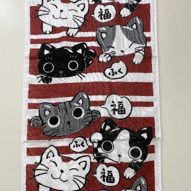 やまねこのフェイスタオル「ふく猫」柄の絵柄の画像